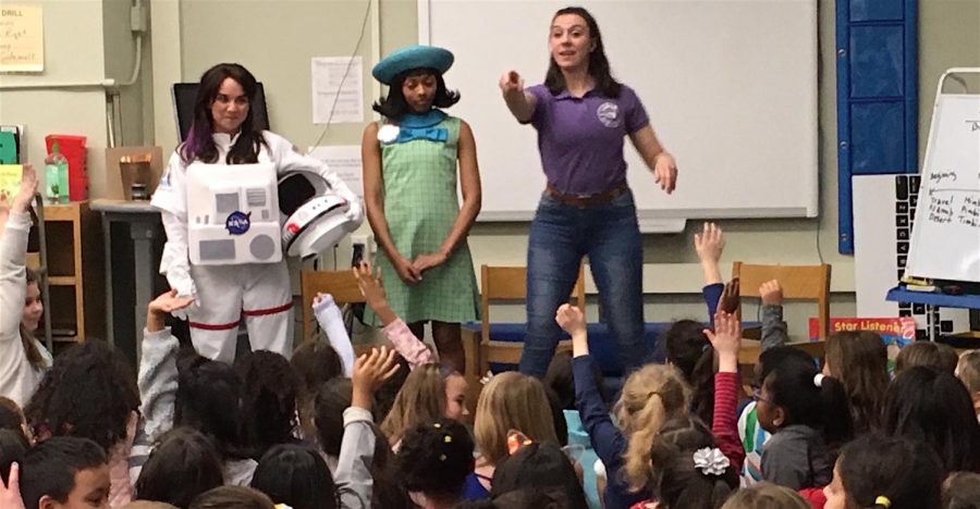 Three actresses from American Girl Live -- Ashley Diane as Luciana (left), Laila Drew as Melody (center), and Monica Poston as Alyssa -- answer questions from students at Hosmer Elementary School in Watertown, Mass., on Jan. 9, 2019.